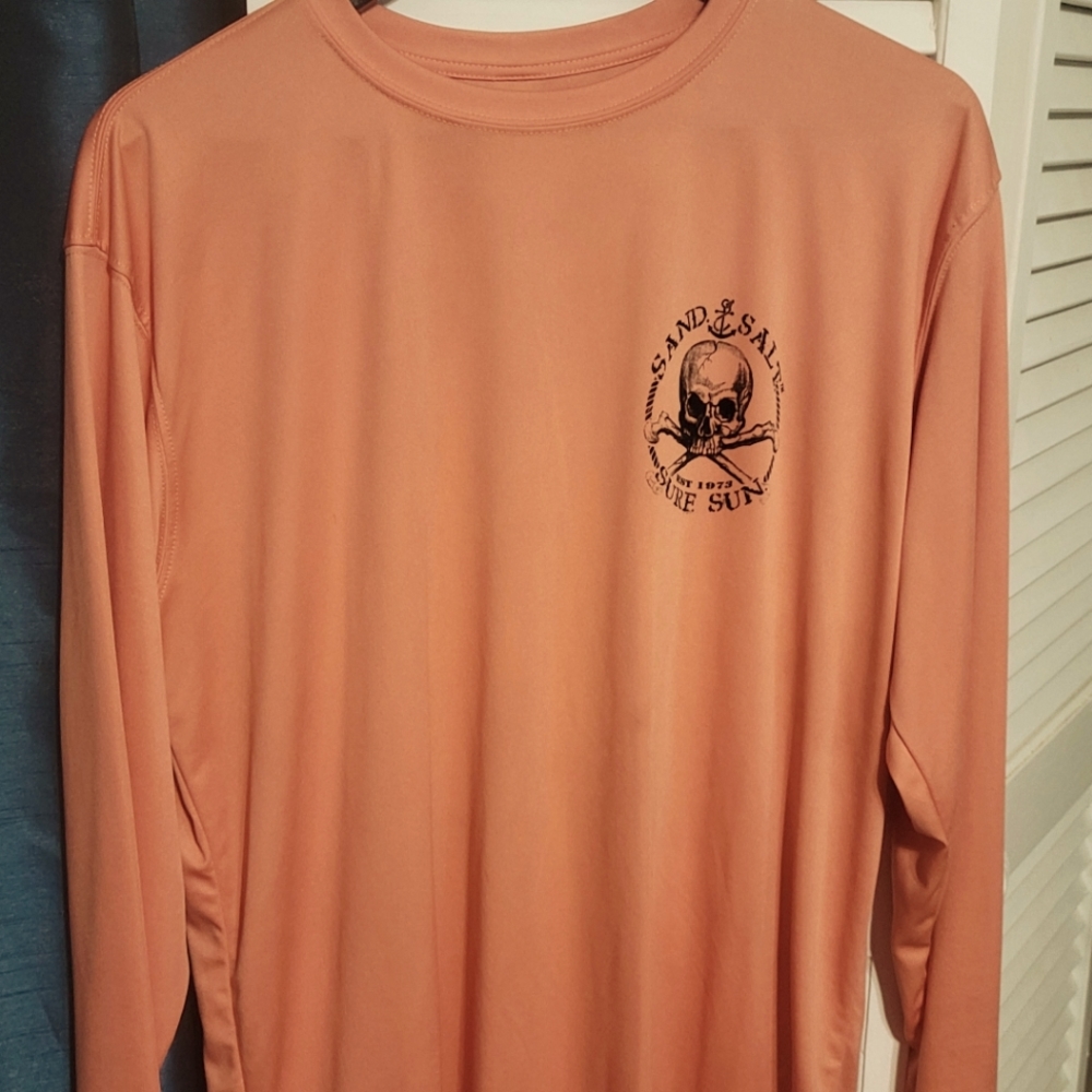 Vixen long sleeve fishing shirt. Pale orange color